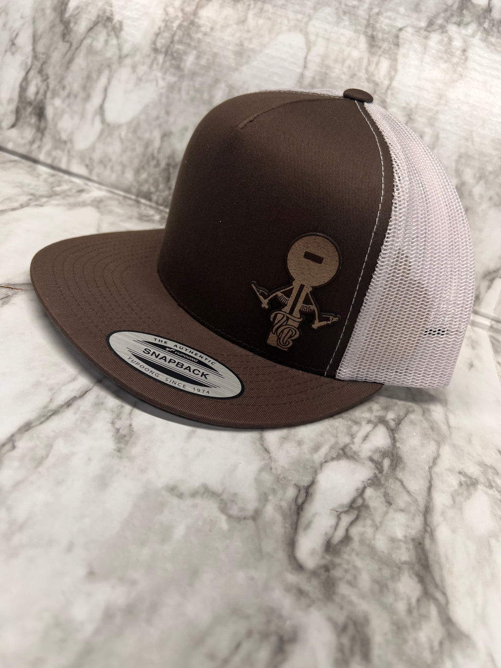 Gold logo brown hat